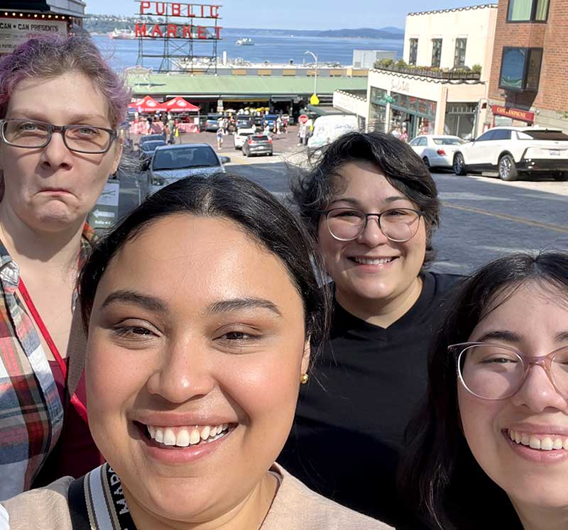 Marcela Perro (foreground) with fellow Align students outside Pike Place Market in Seattle.