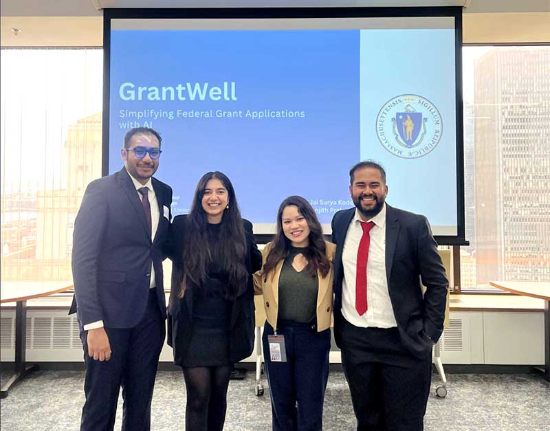 Jai Surya Kode (left) and Anjith Prakash Chathan Kandy (right) with members of the Massachusetts Federal Funds Infrastructure Office